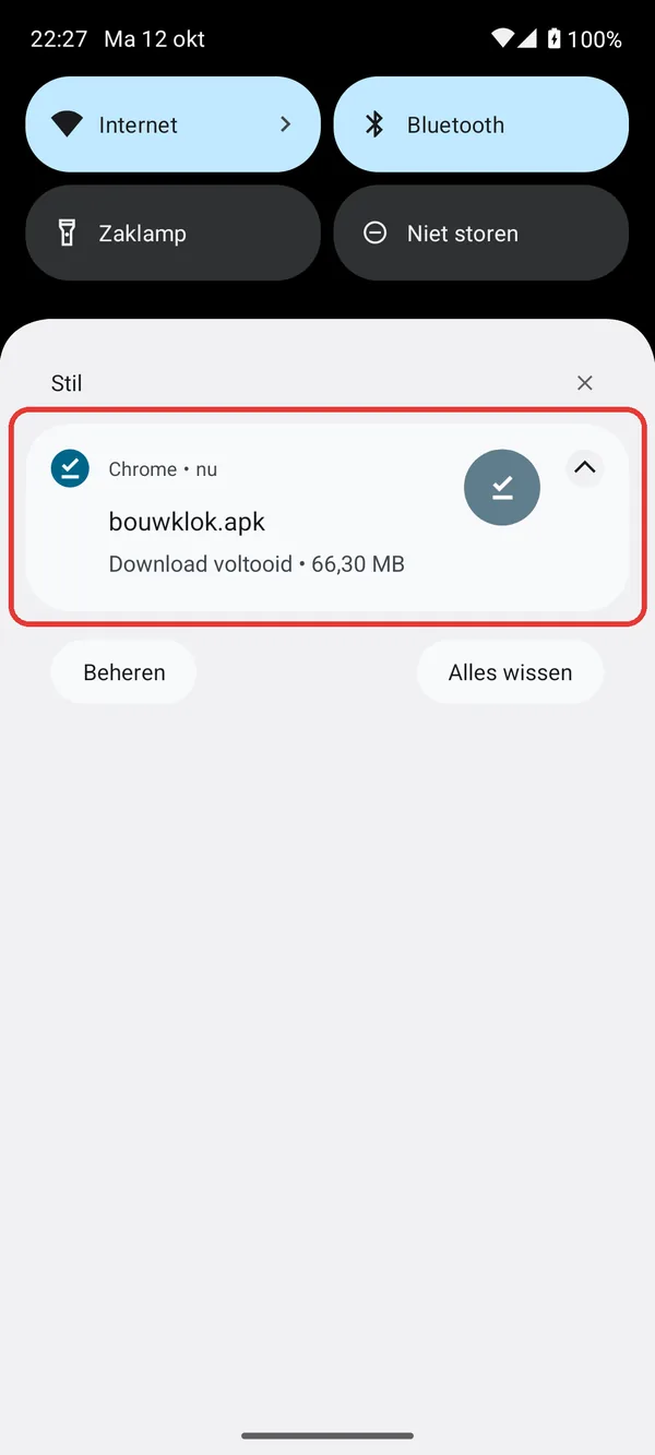 De melding Download voltooid met bouwklok.apk